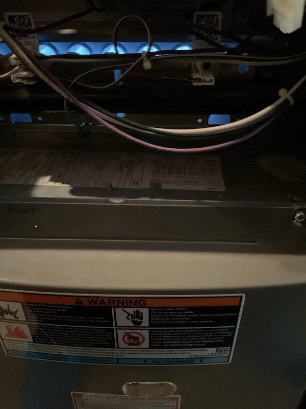 Completed routine MVP furnace maintenance visit and inspection. Accessed interior components, verified blower motor assembly operation, inspected all electrical connections and wiring, and confirmed gas burner assembly firing properly with blue flames visible. All mechanical and safety systems functioning within normal parameters.