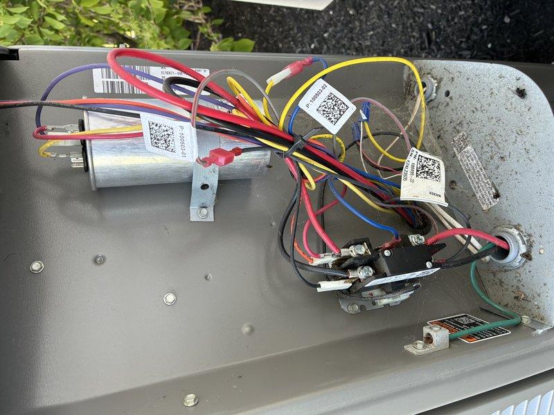 Performed comprehensive preventive maintenance on two-year-old HVAC cooling system for MVP member. Conducted complete system tune-up including inspection of control board, capacitor, and electrical connections. Verified proper operation of all electronic components, circuit board functionality, and wiring harness integrity. Inspected and tested run capacitor, confirmed secure mounting and proper electrical connections. Checked all wire terminations, terminal blocks, and connector housings for signs of wear or loose connections. Documented system condition with photographs of control panel and electrical components. All components found in good working condition with no immediate repairs required. System operating within manufacturer specifications.