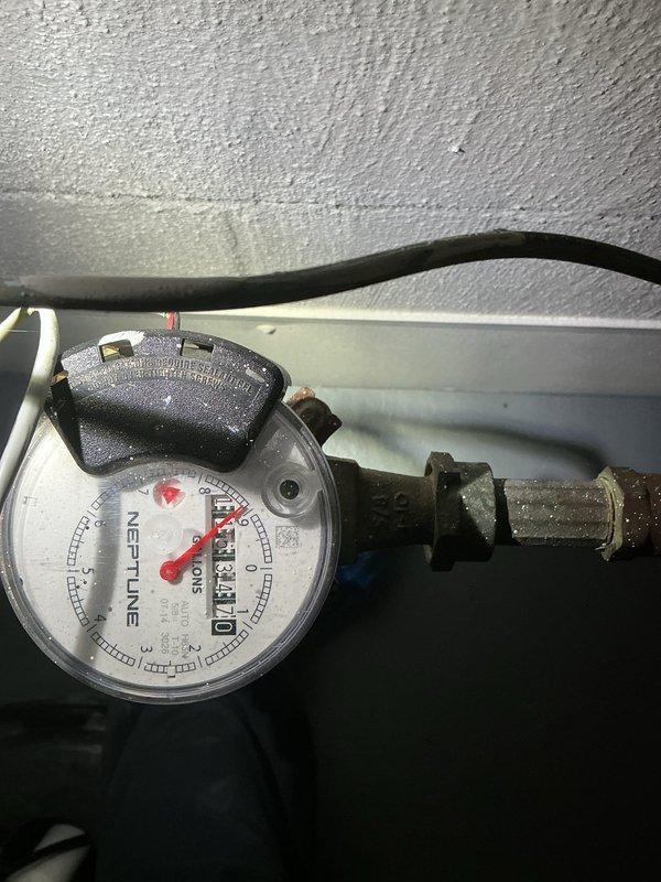 Completed MVP backflow prevention test on system up to 2" in size per regulatory requirements. Tested backflow assembly mounted on exterior brick wall, verified proper operation of check valves and relief valve, and documented water meter readings. All components passed inspection and system is functioning within acceptable parameters for cross-connection control.