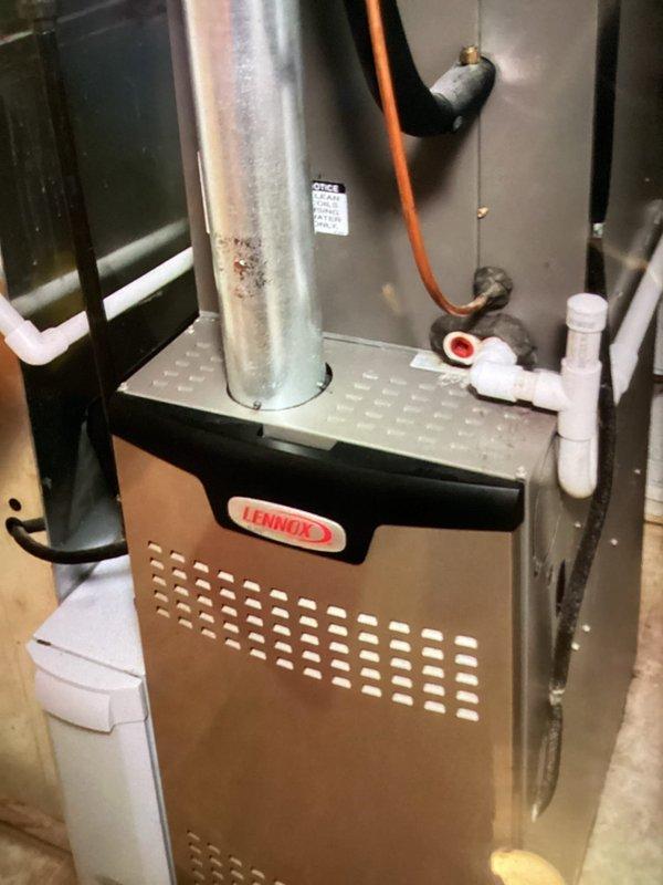 Completed scheduled BS-MVP cooling maintenance visit on 8-year-old Lennox HVAC system. Performed comprehensive inspection of outdoor condensing unit electrical components, indoor furnace unit, and all associated connections. Verified proper operation of contactors, relays, capacitor, and control wiring; documented equipment condition through photographic records of electrical panel and indoor unit installation.