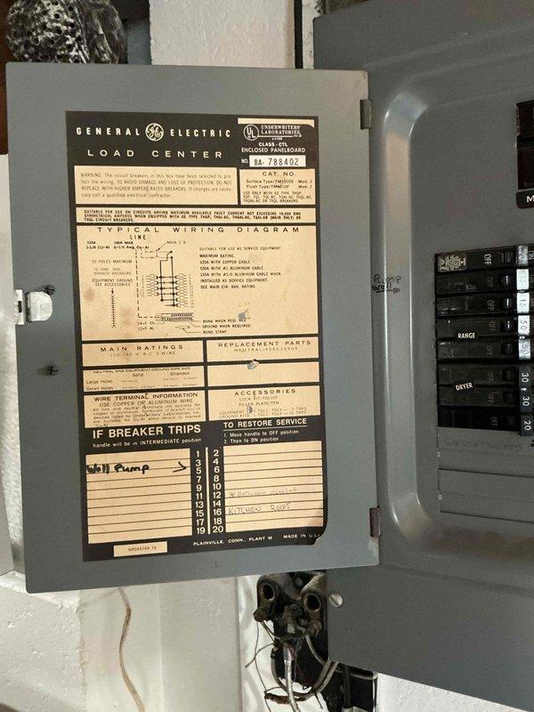 Conducted on-site electrical assessment for Generac generator installation. Evaluated existing General Electric load center and main service panel to determine compatibility and capacity for generator integration. Documented current electrical infrastructure including main breaker configuration, existing circuit layout serving range, dryer, well pump, and kitchen panel circuits. Assessment will inform generator transfer switch installation requirements and necessary electrical modifications for proper generator interconnection.