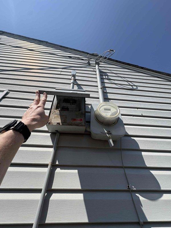Conducted on-site assessment at single-family residence built in 1950 for HVAC system replacement estimate. Evaluated existing aging furnace for conversion to electric heating system and assessed air conditioning requirements in conjunction with available promotional equipment offerings. Documented electrical service panel configuration and exterior electrical infrastructure to determine compatibility and capacity for proposed electric heating installation. Prepared multiple estimate options for complete system replacement including both heating and cooling equipment suitable for residential application.