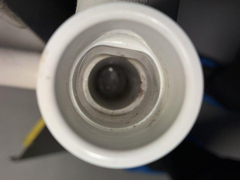 Performed routine maintenance on a 2-year-old air conditioning system under manufacturer's MVP program. Inspected and cleaned outdoor condenser coil which showed moderate dirt and debris accumulation on aluminum fins. Cleared condensate drain line of mineral deposits and verified proper drainage flow to prevent future blockages.