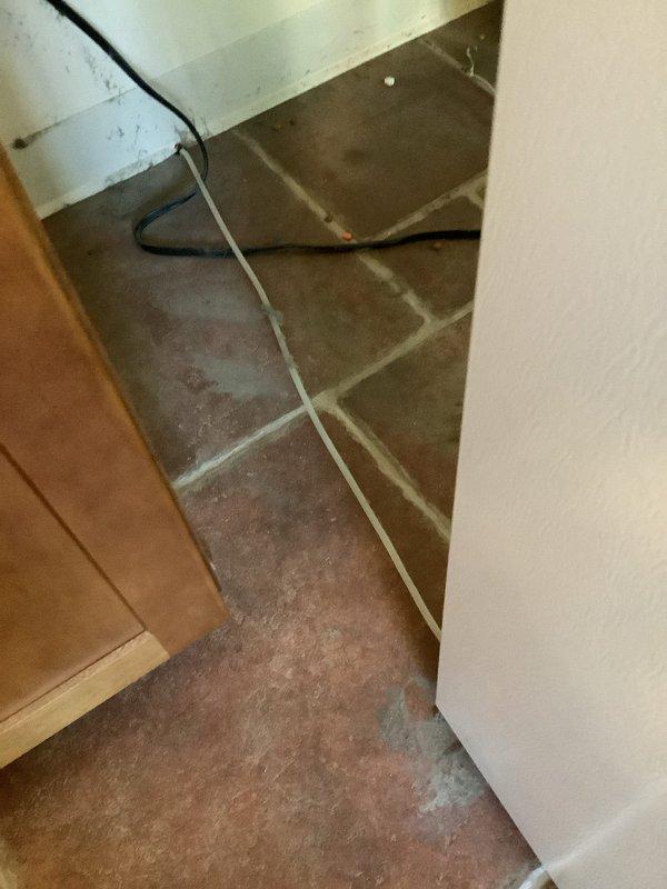 Installed water shut-off valve in kitchen behind refrigerator per customer request. Verified proper water supply access and completed installation with all connections tested for leaks and proper operation.