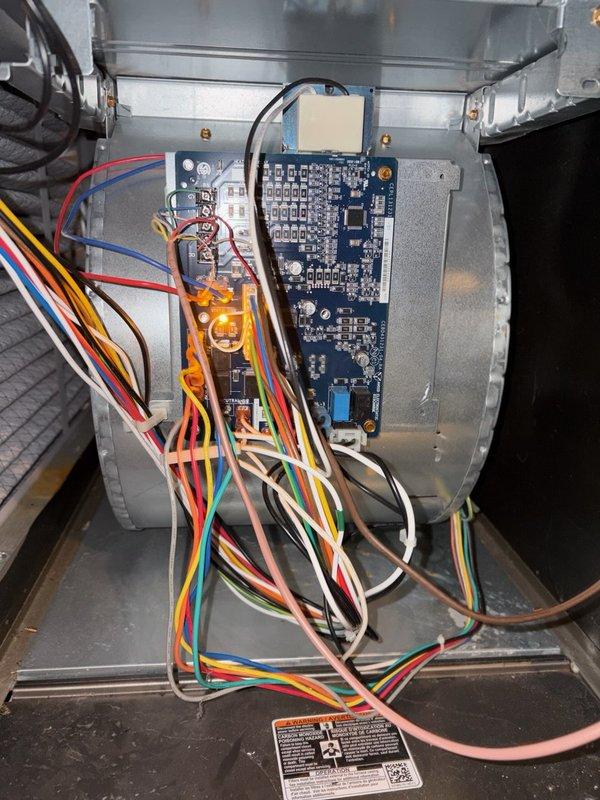 Responded to no heat call on 6-7 year old Carrier furnace with recurring issues from previous winter. Upon inspection, accessed control compartment and evaluated electronic control board, relay module, and associated wiring connections. Verified installation date of January 2022 and documented system configuration. Performed diagnostic assessment of control components and wiring harness to identify cause of heating failure and prevent future occurrences.