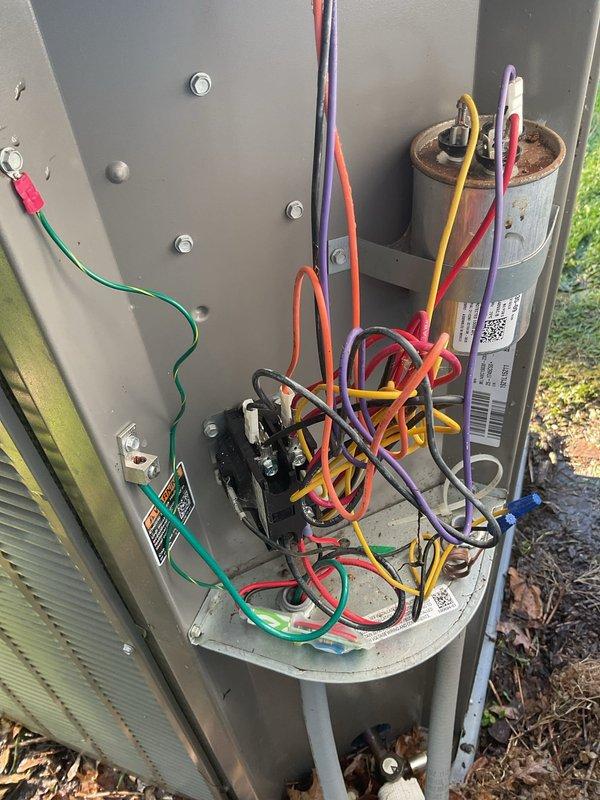Performed inspection of outdoor condensing unit and identified significant dirt buildup on condenser coil affecting system efficiency. Recommended annual chemical cleaning of outdoor condenser to maintain peak performance and optimal heat transfer. Additionally recommended installation of surge protector on outdoor condenser to provide protection against electrical surges and voltage spikes that could damage compressor and electrical components.