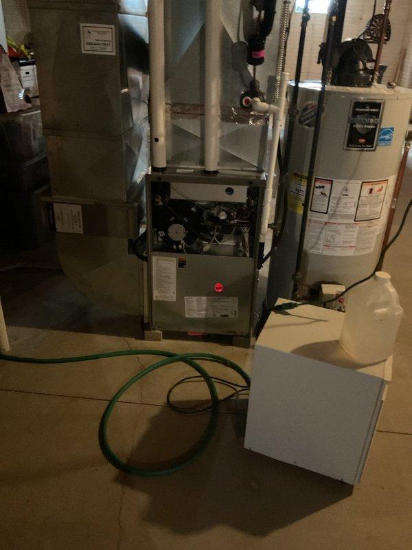 Completed BS-MVP cooling maintenance visit on 5-year-old system. Found and replaced heavily contaminated air filter that was clogged with dust, dirt, and debris throughout the pleated surface. Performed standard cooling system inspection with furnace panel opened to access blower motor and internal components, verified proper operation of all mechanical systems.