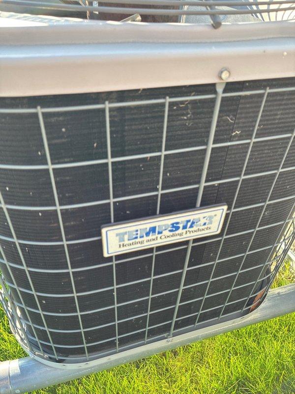 Completed spring air conditioning tune-up and maintenance on a 15-year-old Tempstar cooling system. Performed comprehensive inspection of outdoor condenser unit, verified proper operation of condenser fan assembly, and confirmed system is functioning correctly. All components inspected and found to be in working order.