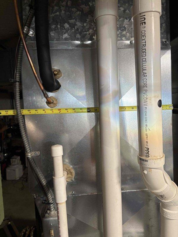 Completed furnace replacement estimate for 15-year-old unit. Documented existing system measurements and configuration, including PVC venting and condensate piping, copper refrigerant lines, and electrical connections. Provided detailed assessment and replacement quote for customer approval.