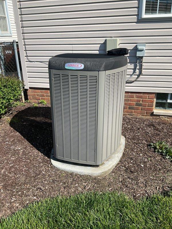 Completed preventive maintenance cooling visit on 8-year-old Lennox condensing unit. Performed standard inspection of outdoor unit including visual assessment of cabinet condition, electrical disconnect, refrigerant lines, and condensate drainage. Unit found operating within normal parameters with no immediate service needs identified. Documented equipment condition with photographs for service records.