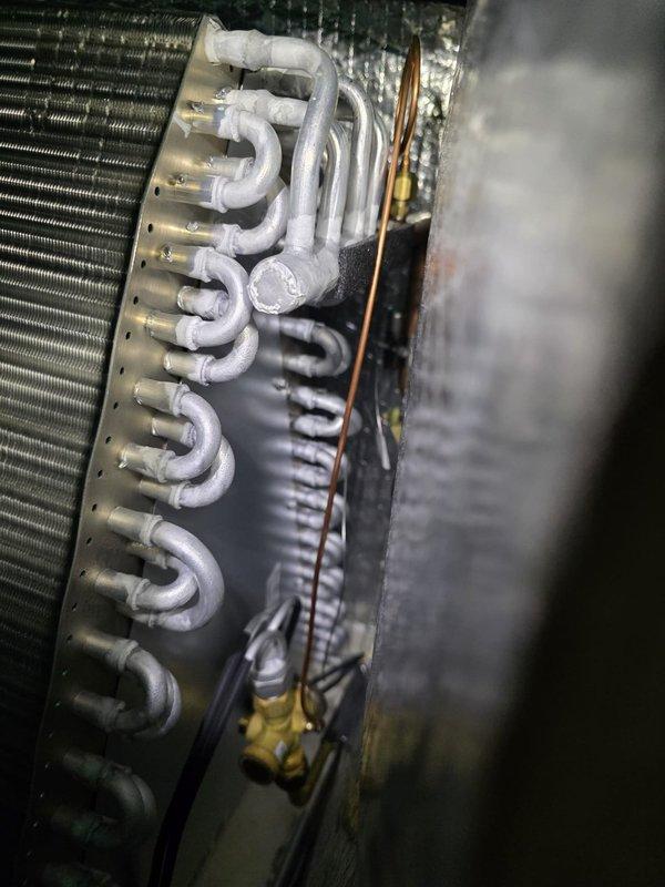 Responded to no cooling complaint and diagnosed low refrigerant charge in system. Scheduled return trip on warm, dry day to properly charge system with R-454B refrigerant. Upon return visit, added refrigerant to manufacturer specifications and verified proper system operation. System restored to full cooling capacity.