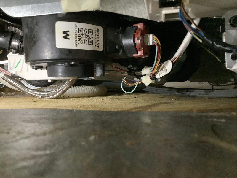 Responded to service call for dishwasher not draining properly, with water remaining at bottom of unit after cycle completion. Upon inspection, accessed underside of 15-year-old dishwasher and examined drain pump assembly, motor components, and associated wiring connections. Verified all electrical connections at junction box were secure and inspected drain hoses for blockages or kinks. Assessed overall condition of drain pump motor and drainage system components to determine cause of standing water issue.