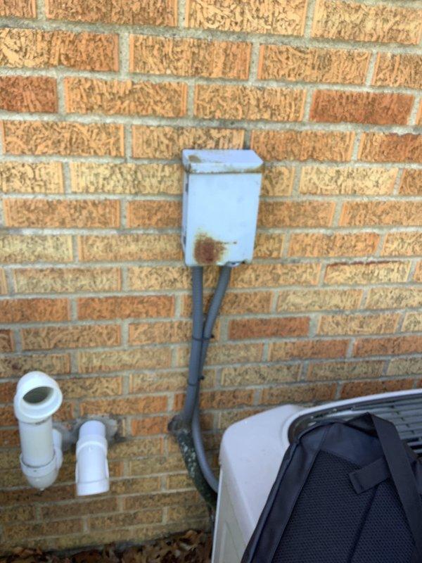 Completed on-site evaluation for replacement estimate of aging HVAC system including 14-year-old furnace and 20-year-old air conditioning unit, both located in crawl space. Documented existing equipment conditions with photographic evidence showing air handler with significant condensation issues on adjacent ductwork and exterior condensing unit with visible corrosion on electrical junction box. Provided comprehensive replacement recommendations for complete system upgrade.