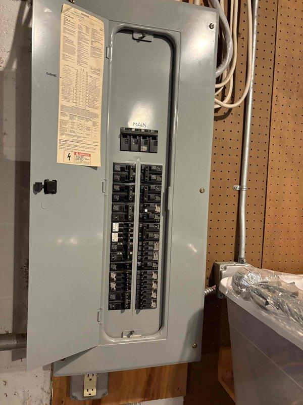 Conducted comprehensive electrical estimate for residential backup generator installation. Evaluated existing electrical panel capacity and configuration, documenting current breaker arrangement and available space for generator integration. Customer has natural gas service available and HOA approval in place for the installation. Assessed panel compatibility for automatic transfer switch installation, photographed existing electrical infrastructure including main breaker panel and circuit distribution system to determine proper sizing and connection requirements for proposed generator system.