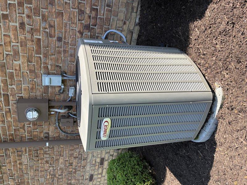 Responded to service call for 10-year-old air conditioning system during scheduled MVP maintenance visit. Performed comprehensive system inspection of outdoor condenser unit and interior mechanical components, including examination of refrigerant lines, copper tubing, control valves, and associated piping. Documented equipment condition through photographic records showing normal wear patterns on copper lines and verified proper mounting and accessibility of all service components within the mechanical cabinet.