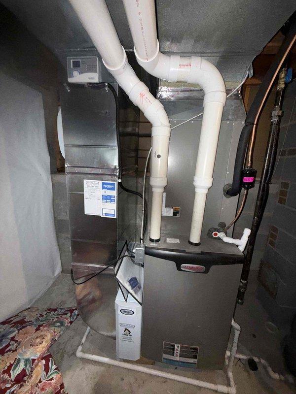 Completed routine HVAC maintenance inspection on residential cooling system, including Lennox outdoor condensing unit and indoor furnace with associated components. Performed diagnostic testing and system evaluation, documenting equipment condition through photographic records. Event dismissed as no further action required at this time.