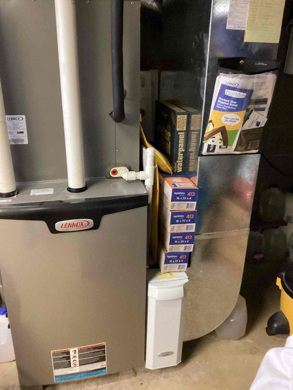 Completed routine preventive maintenance on a 9-year-old residential air conditioning system. Inspected outdoor condensing unit including compressor, refrigerant lines, electrical connections, and condensate drain pan. Verified proper operation of indoor Lennox furnace and associated HVAC components. All equipment found operating within normal parameters with no immediate service needs identified.