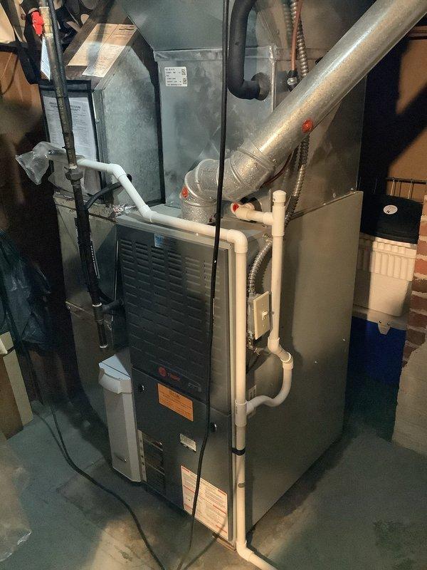 Completed comprehensive MVP cooling maintenance on Lennox air conditioning system. Performed thorough inspection of outdoor condenser unit and indoor furnace components, verified proper operation of all equipment, checked refrigerant levels, cleaned condenser coils, inspected electrical connections and disconnect box, examined ductwork and PVC condensate drain lines for proper function. All systems operating within normal parameters upon completion of scheduled maintenance visit.
