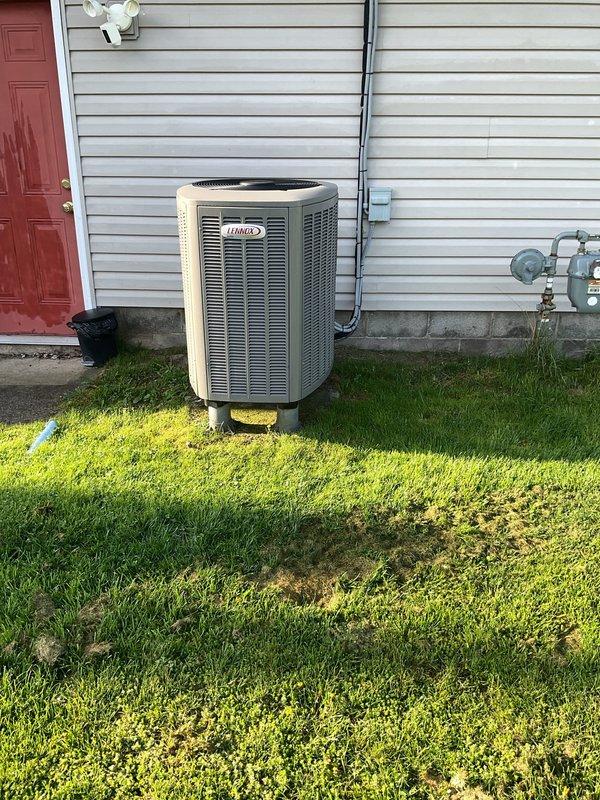Completed preventive maintenance service on residential Lennox cooling system. Performed comprehensive inspection of outdoor condenser unit including coil cleaning, electrical connections check, and refrigerant level verification. Accessed air handler in garage using appropriate tall ladder to inspect blower assembly, evaporator coil, and condensate drain system. Verified proper operation of electrical disconnect and all safety controls. System tested and operating within manufacturer specifications.