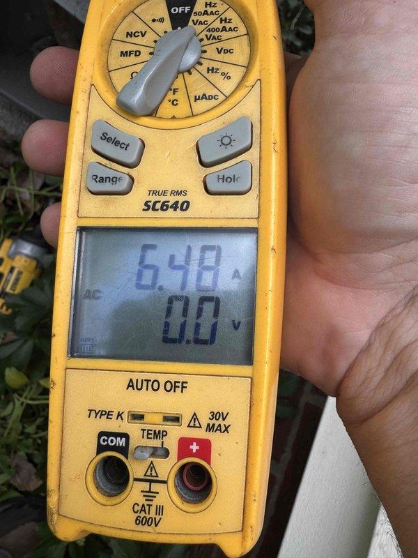 Completed routine cooling maintenance on 8-year-old air conditioning system as part of MVP recurring service program. Performed comprehensive system inspection including electrical connections, capacitor testing with digital multimeter showing 6.48A draw, and visual assessment of blower motor assembly which displayed minor surface oxidation and patina consistent with unit age. All components found operating within normal parameters and system cleared for continued operation.