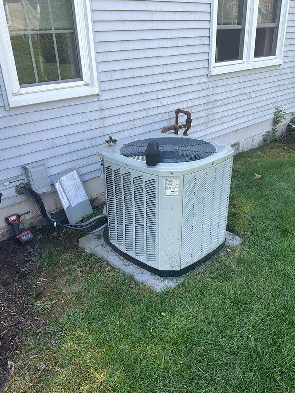 Completed seasonal air conditioning tune-up on residential outdoor condensing unit. Performed standard maintenance procedures and system inspection, including internal ductwork examination using borescope camera to verify interior conditions. Customer requested technician to return for follow-up service.