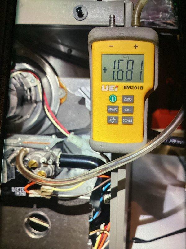 Completed MVP heating maintenance visit on residential heating system. Performed diagnostic temperature measurements using digital meter at blower motor assembly, verifying proper operational parameters within manufacturer specifications. Inspected and replaced air filter to maintain optimal airflow and system efficiency.