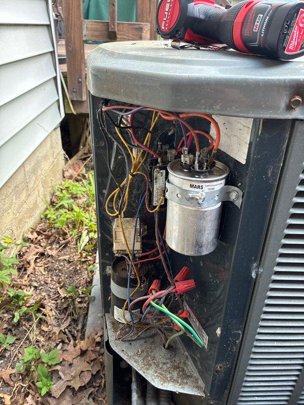 Completed comprehensive tune-up on 5-year-old Trane air conditioning system. Performed standard maintenance procedures including inspection of electrical components, capacitor testing, and system evaluation. Unit accessed for internal component inspection, with all electrical connections and MARS capacitor found in acceptable condition for continued operation.