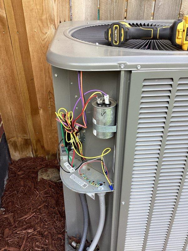 # HVAC Maintenance - Cooling

Completed comprehensive MVP cooling maintenance visit on 3-year-old air conditioning system. Performed thorough inspection of outdoor condensing unit, including removal of access panel to evaluate internal electrical components and connections. Inspected capacitor condition, noting surface weathering, and verified all electrical connections and wiring integrity throughout the system. All components tested and found operational within manufacturer specifications.