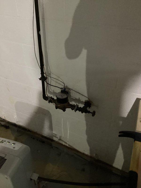Completed 200A electrical service upgrade with full compliance to 2023 National Electrical Code requirements, including installation of required exterior disconnect. Installed dedicated EV charging circuit with appropriate conduit runs and mounted customer-supplied Tesla wall charger in garage workspace. All necessary code updates were implemented during the service upgrade, including proper grounding, bonding, and overcurrent protection. The installation features metallic conduit routing along wall surfaces to protect branch circuits, with the EV charger positioned for optimal vehicle access. All components were tested and verified operational upon completion.