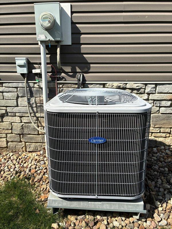 Completed MVP recurring cooling maintenance visit on residential Carrier HVAC system. Performed comprehensive inspection of indoor furnace unit with integrated Aprilaire humidifier and outdoor condenser unit, verified proper operation of all components, documented system condition through photographic records, and confirmed equipment is functioning within normal parameters for continued reliable cooling performance.