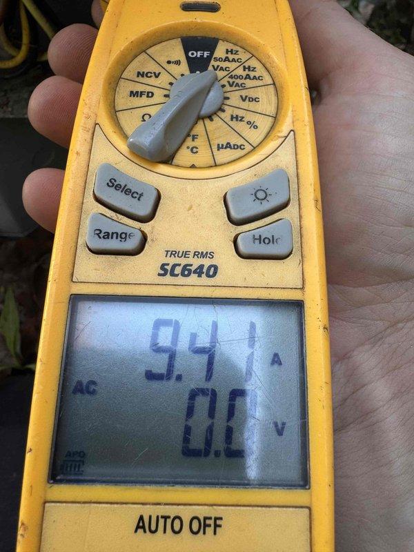 Completed preventative maintenance tune-up on residential outdoor condensing unit. Performed standard system diagnostics including electrical measurements, verified compressor amperage at 9.41A within normal operating parameters, and inspected all accessible components. Unit operational with no immediate deficiencies noted, though vegetation encroachment around equipment base should be addressed by homeowner to maintain proper airflow clearance.