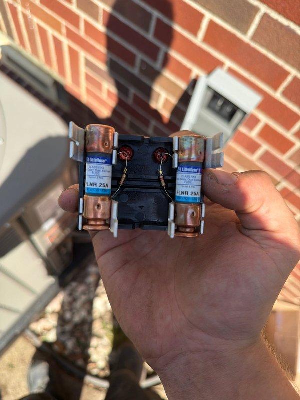 Completed installation of 80% efficiency furnace with add-on air conditioning system and new ductwork. Installed outdoor condensing unit on concrete pad against exterior brick wall, mounted electrical disconnect with 25-amp fuses, and integrated complete duct system to provide whole-home cooling capacity. All components tested and operational upon completion.