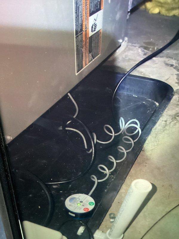 Completed annual maintenance on two AC units with two air handlers. Performed system inspection, changed air filters, and documented equipment condition with photos of control panel and internal ductwork components.