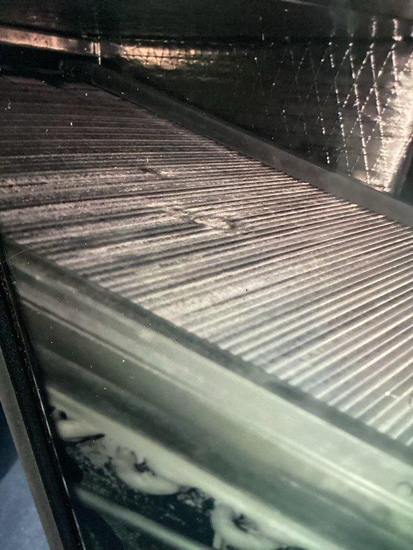 Completed annual maintenance on two AC units with two air handlers. Performed system inspection, changed air filters, and documented equipment condition with photos of control panel and internal ductwork components.
