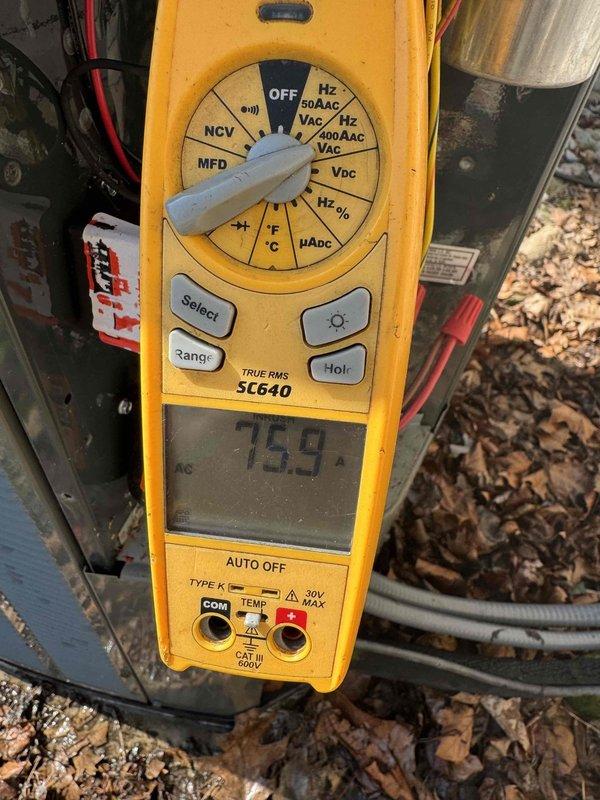 Completed MVP recurring cooling maintenance visit on 12-year-old system located in back room near garage. Performed comprehensive diagnostic testing using digital multimeter, recording temperature differential readings of 75.4°F and 45.36°F to verify proper system operation and cooling capacity. All measurements confirmed unit is operating within normal parameters for seasonal performance.