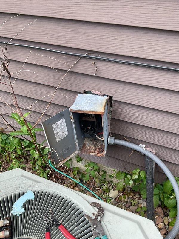 Responded to no-cooling complaint on approximately 40-year-old Trane XE 900 air conditioning system. Upon arrival, performed visual inspection of outdoor condensing unit, which exhibited significant age-related deterioration including extensive rust, corrosion, and weathering on cabinet panels. Connected manifold gauge set to service ports to assess refrigerant pressures and system operation. Due to advanced age of equipment and observed condition, recommended system replacement rather than repair, as unit has far exceeded typical service life expectancy and replacement parts are no longer readily available for this vintage model.