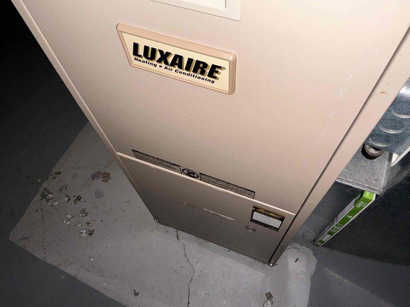 Provided estimate for complete HVAC system replacement on a 14-year-old Luxaire heating and air conditioning unit. Performed leak search diagnostic on the existing system and documented current equipment condition with photos of both the indoor air handler in the mechanical room and outdoor condensing unit.