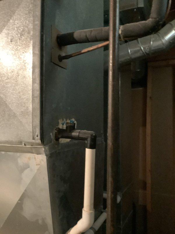 Conducted comprehensive assessment of existing HVAC system including furnace and air conditioning equipment for replacement estimate. Evaluated current installation consisting of Aprilaire humidifier unit with integrated ductwork, main supply plenum, and associated mechanical components in basement utility area. Documented existing system configuration, ductwork layout, electrical controls, and plumbing connections to provide accurate replacement specifications for new furnace and air conditioning system.
