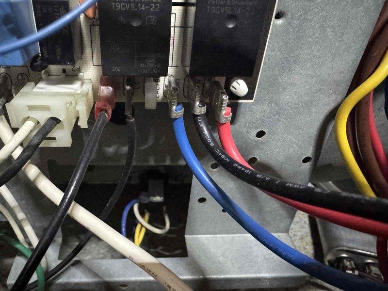 Replaced failed blower motor and wheel assembly in HVAC system. Removed old motor from squirrel cage housing, installed new motor with proper electrical connections including multi-conductor wiring to terminal block and contactors, and tested system operation to verify proper airflow and function.