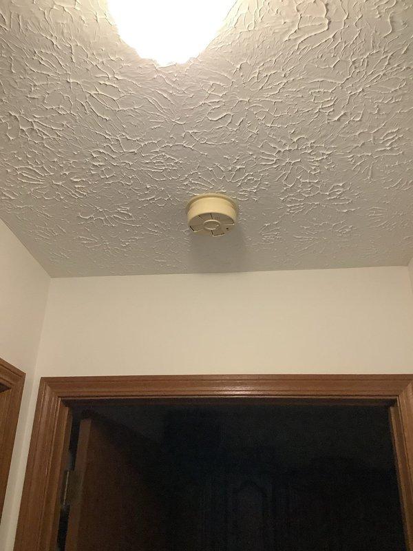Responded to callback for flickering lights following generator installation. Inspected electrical connections at control board and verified proper terminations at terminal blocks, then tested ceiling-mounted lighting fixtures to confirm stable operation and resolve intermittent flickering issue.