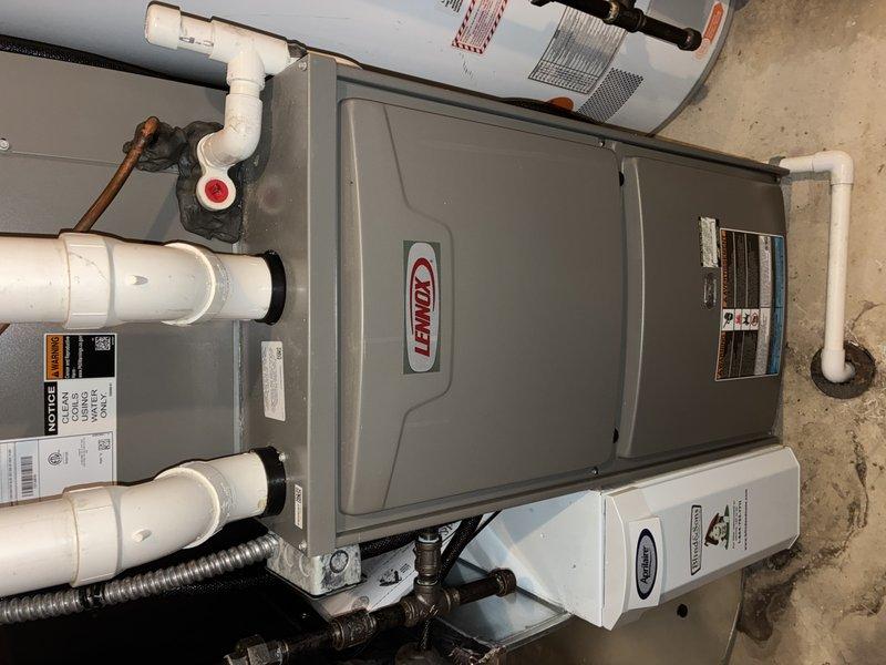 Completed air conditioning tune-up on four-year-old Lennox system. Performed standard maintenance inspection of outdoor condensing unit and indoor air handler components, including blower motor assembly and PVC condensate drainage system. Furnace tune-up was rescheduled for future appointment per customer request.