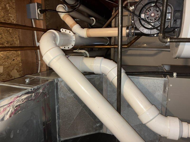 Completed air conditioning tune-up on four-year-old Lennox system. Performed standard maintenance inspection of outdoor condensing unit and indoor air handler components, including blower motor assembly and PVC condensate drainage system. Furnace tune-up was rescheduled for future appointment per customer request.