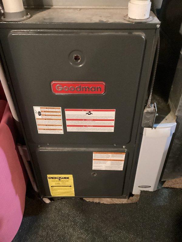 Completed routine air conditioning maintenance on Goodman HVAC system. Performed comprehensive inspection of furnace unit, ductwork, refrigerant lines, and associated plumbing connections. Documented existing copper line oxidation and condensation on mechanical components, with all systems operating within normal parameters at time of service.