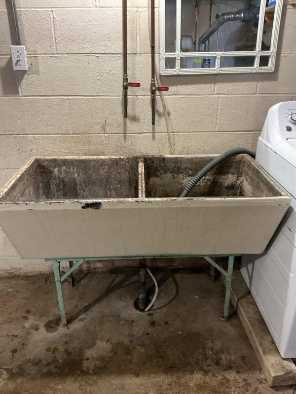 Performed standard tanked water heater flush and fill service. Drained sediment buildup from tank bottom through drain valve, flushed system with fresh water until discharge ran clear, then refilled tank and restored unit to normal operation. Verified proper function of temperature and pressure relief valve and inspected visible plumbing connections for leaks upon completion.