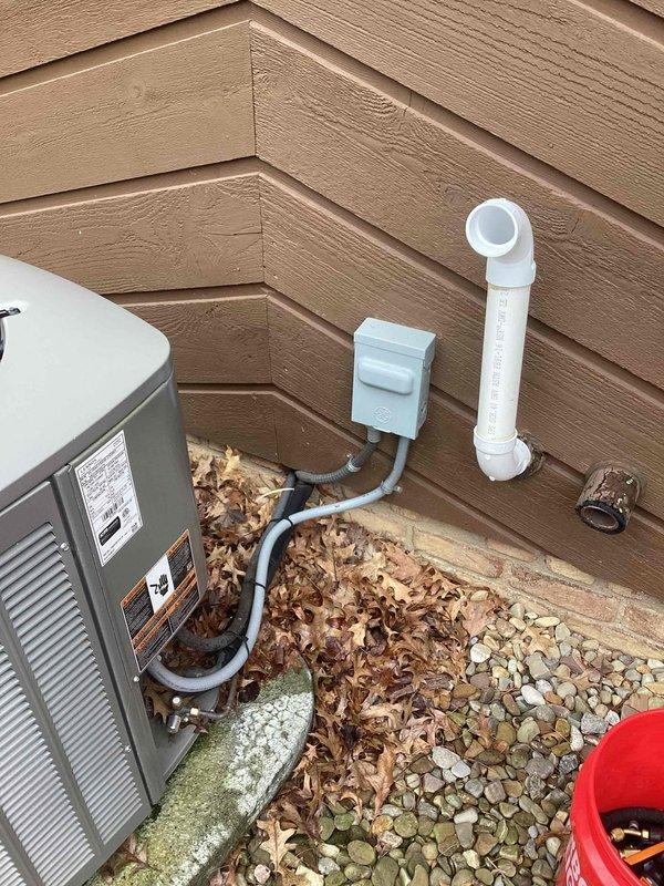 Completed MVP recurring cooling maintenance visit on residential air conditioning system. Performed comprehensive inspection of outdoor condenser unit, verified refrigerant line connections and valve operation, checked electrical components and conduit connections, and documented system condition with photos. Unit operating properly with no issues identified during service call.
