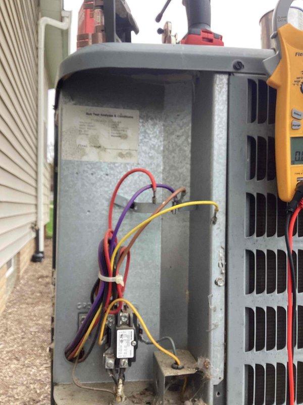 Responded to no cooling call on outdoor air conditioning unit. Upon arrival, accessed electrical compartment and performed diagnostic testing using digital multimeter. Tested capacitor and contactor operation to identify cause of system failure. Verified proper voltage readings and checked electrical connections throughout the unit. Restored cooling operation and closed up equipment. System tested and confirmed operational before departure.