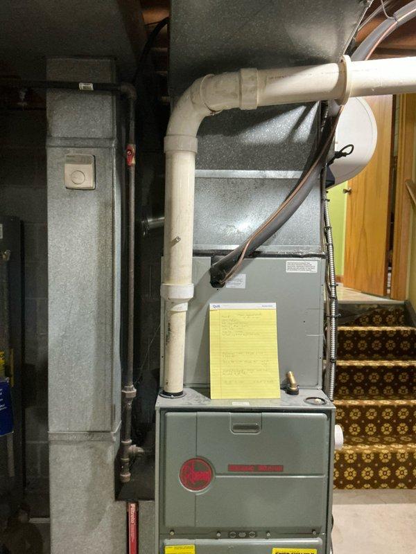 Conducted on-site evaluation of 23-year-old HVAC system with R22 air conditioning unit and Rheem furnace in basement installation. Assessed existing equipment condition, measured installation space dimensions, documented current system configuration including ductwork and PVC condensate piping, and provided comprehensive replacement estimate for both furnace and air conditioning components.