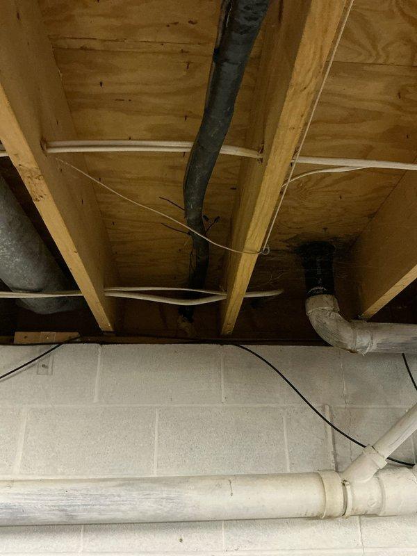Completed on-site evaluation for HVAC system replacement on a 37-year-old unit located in basement mechanical room. Assessed existing equipment configuration including condensate management, ductwork routing through floor joists, and electrical service connections. Documented current system installation including water heater proximity, concrete pad foundation condition, and available clearances for new equipment installation. Provided comprehensive replacement quote covering new system specifications and installation requirements.