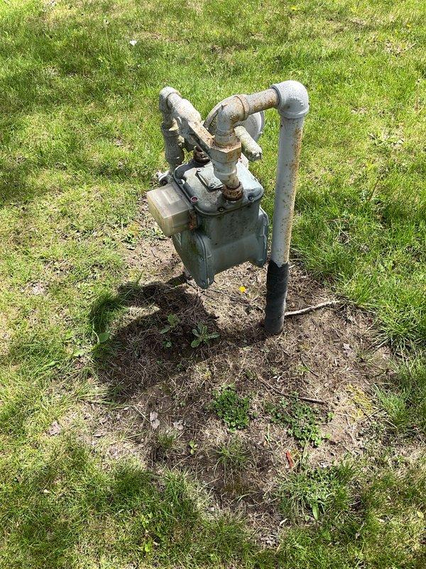 Responded to gas service call for reported gas leak with gas supply shut off at roadside meter. Performed systematic leak detection inspection throughout property, checking all natural gas appliances, connections, and supply lines. Inspected interior gas piping at electrical panel area and exterior meter installation. Documented findings with photos and contacted property owner with results and recommendations for restoring gas service.