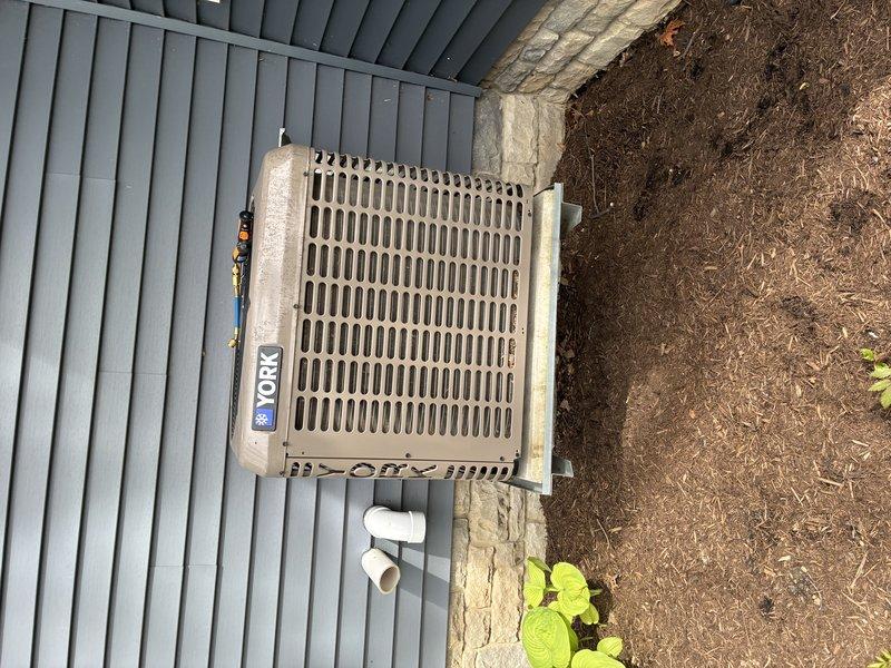Completed scheduled maintenance on 8-year-old York air conditioning system. Performed comprehensive inspection of outdoor condensing unit, verified proper operation of all electrical connections at junction box, and confirmed system functionality. Unit operating within normal parameters with no issues identified during routine preventative maintenance visit.